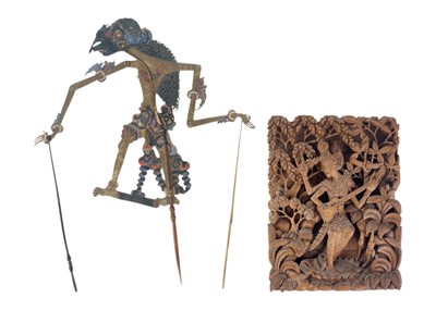 Lot 650 - A Javanese painted and pierced shadow puppet.