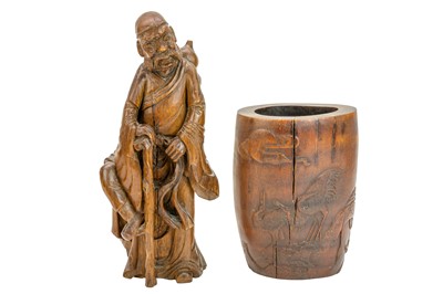 Lot 554 - A Chinese carved wood figure of Li Tieguai.