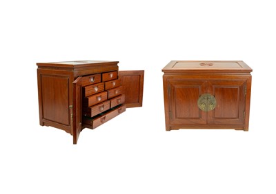 Lot 642 - A Chinese teak jewellery or collector's cabinet.
