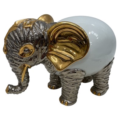 Lot 140 - A Silver, White and Gold Ornate Elephant made...