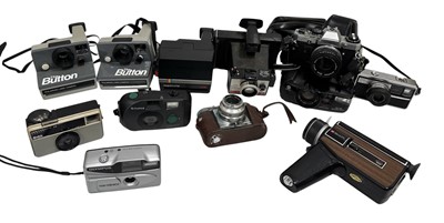 Lot 138 - Vintage film and Polaroid cameras with...