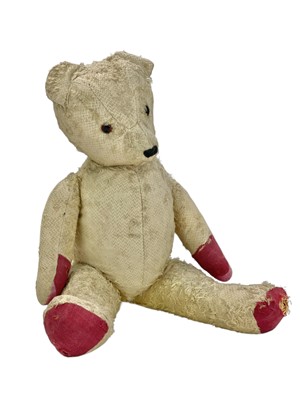 Lot 265 - A vintage straw-filled teddy bear.