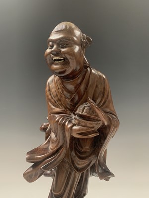 Lot 116 - A Chinese carved hardwood figure of buddha,...