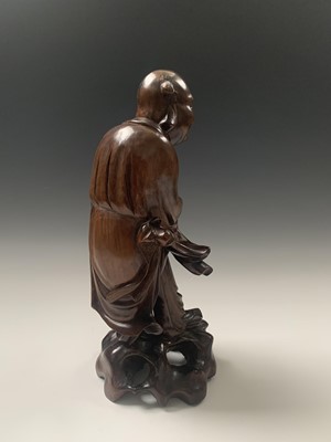 Lot 116 - A Chinese carved hardwood figure of buddha,...