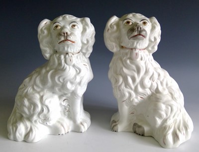 Lot 836 - A pair of Victorian Staffordshire curly coated...