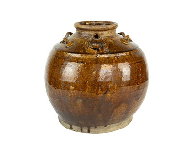 Lot 565 - A Chinese martaban spouted storage jar.