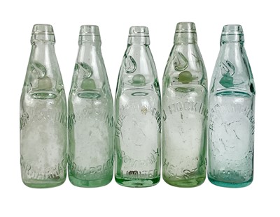 Lot 438 - Five local interest glass codd bottles.