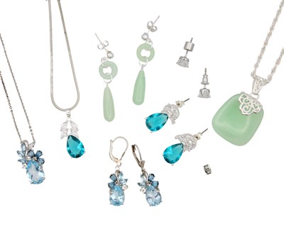 Lot 6 - Three sets of silver pendant necklaces with earrings, in a small travel jewellery box.