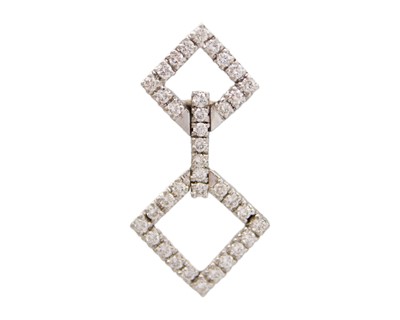 Lot 94 - An attractive 18k white gold and diamond set pendant and earring suite.