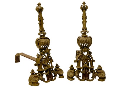 Lot 14 - A pair of French brass chenets.
