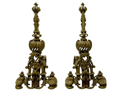 Lot 14 - A pair of French brass chenets.