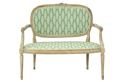 Lot 857 - An elegant French carved beech canape.