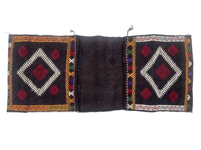 Lot 676 - A double camel saddlebag.