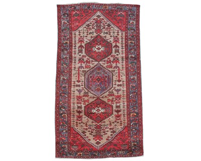 Lot 677 - A Persian rug.