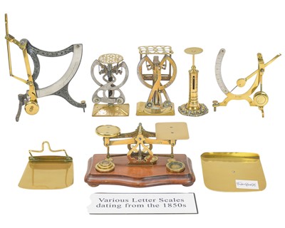 Lot 202 - A collection of postal scales.