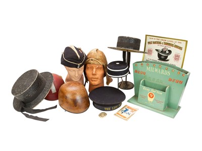 Lot 62 - A collection of hats, hat stands and mannequin heads.