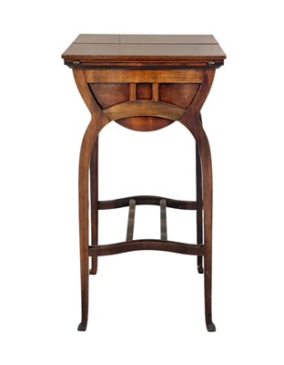 Lot 897 - An Edwardian mahogany sewing and work table.