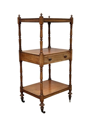 Lot 889 - An early Victorian mahogany three tier whatnot.