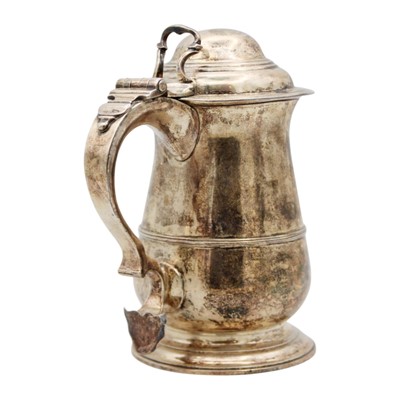 Lot 214 - A rare George II silver lidded tankard by Thomas Moore II.
