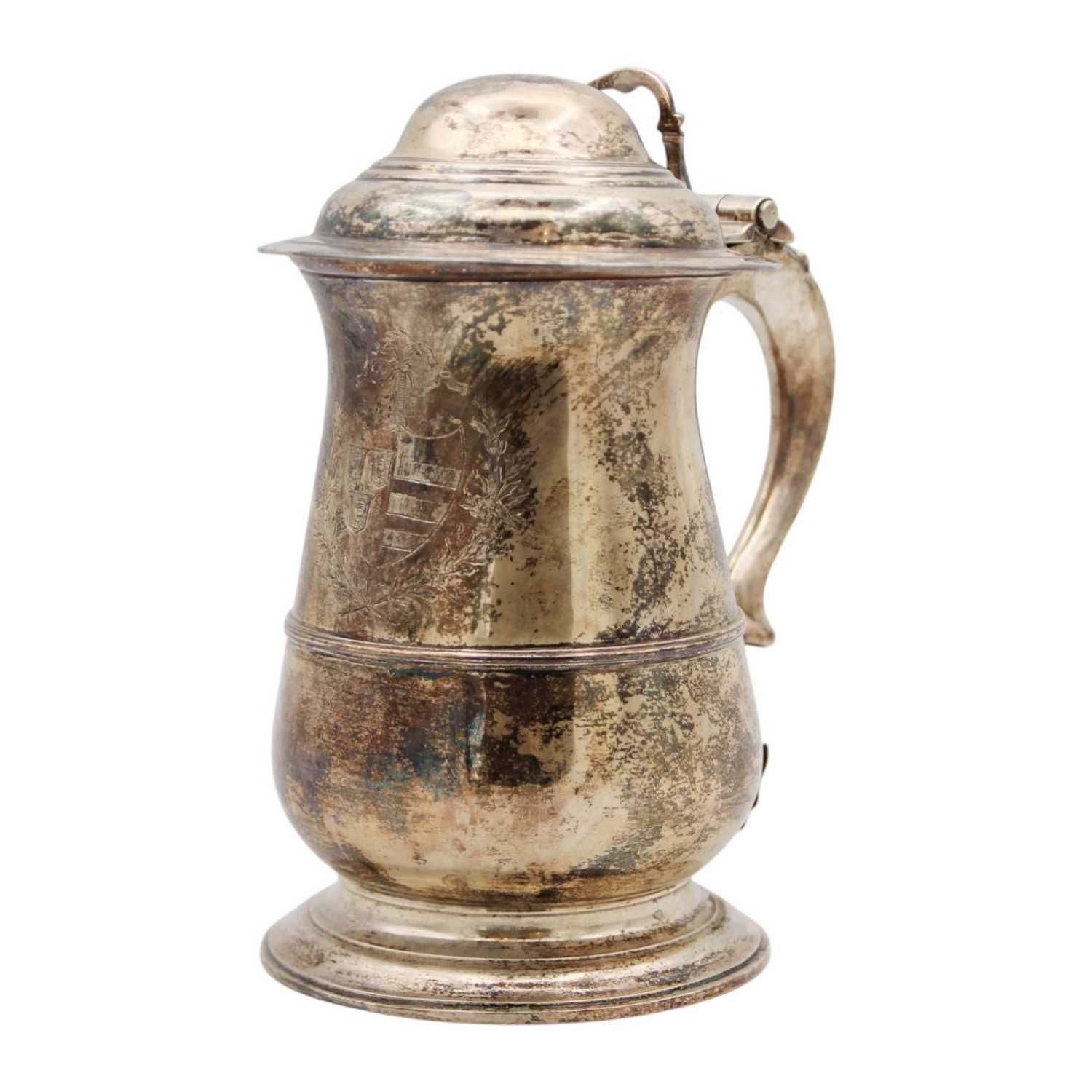 Lot 214 - A rare George II silver lidded tankard by Thomas Moore II.