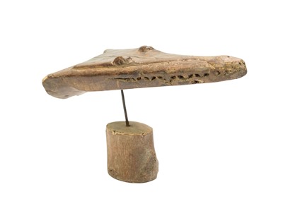 Lot 43 - A carved hardwood crocodile canoe prow.