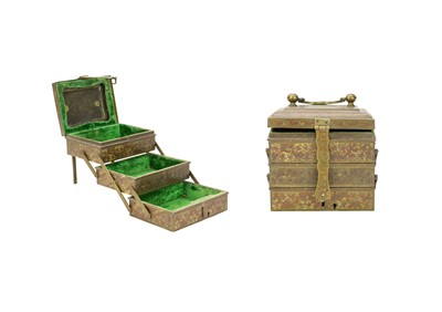 Lot 79 - An Indian brass and enamel decorated three section vanity box.