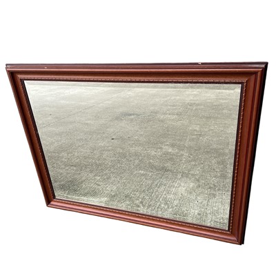 Lot 215 - A wood-framed Bevelled edge wall mirror with...