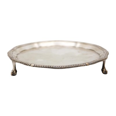 Lot 267 - An Edwardian silver waiter by Goldsmiths & Silversmiths Company.