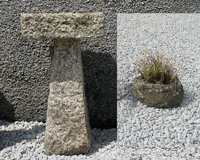 Lot 773 - A granite bird bath with rectangular basin.