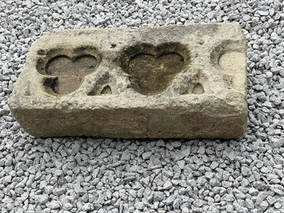 Lot 782 - A section of stone with blind trefoil carving.