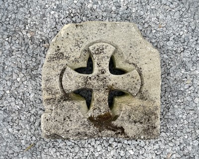 Lot 787 - A section of stone carved with a cross.