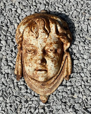 Lot 778 - A 19th century cast iron wall mask.