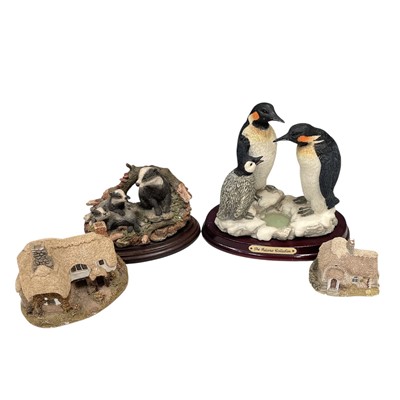 Lot 79 - Four resin figures, the largest being 17cm tall.