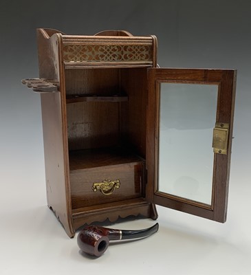 Lot 146 - An Edwardian walnut smoker's cabinet, with a...