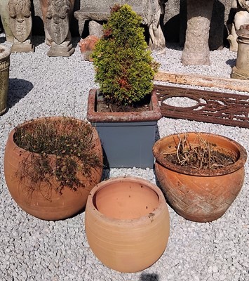 Lot 155 - Three modern terracotta plant pots, the...