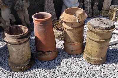 Lot 154 - Four reclaimed chimney pots. The largest 58cm....
