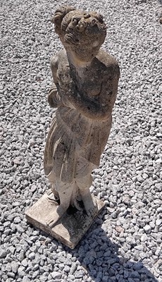 Lot 151 - A reconstituted stone garden sculpture of a...