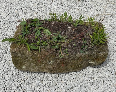 Lot 753 - A weathered granite trough.