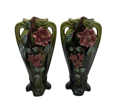 Lot 8 - A pair of Art Nouveau English majolica floral...