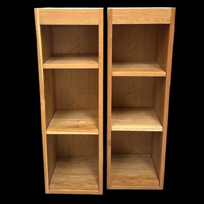 Lot 42 - Two blond oak bookcases, 32cm wide, 100cm tall...