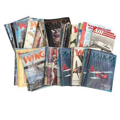 Lot 90 - A collection of World War magazines and Wings...