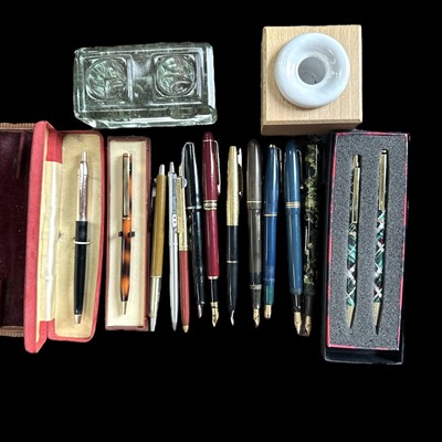 Lot 95 - A collection of pens, four with 14k gold nibs,...