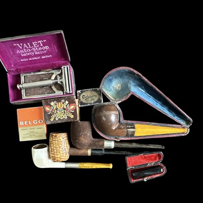 Lot 98 - A selection of smoking memorabilia, including...