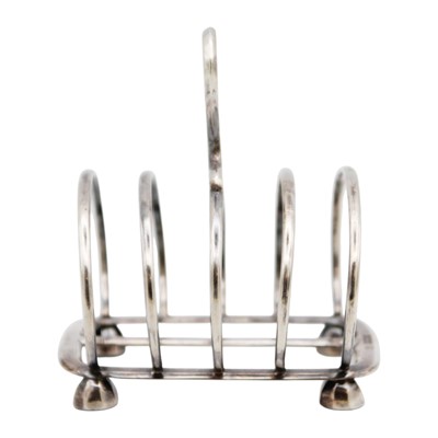 Lot 247 - A George V silver four section toast rack by Harrison Brothers & Howson.
