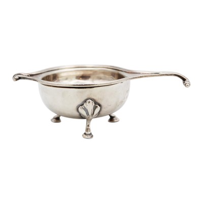 Lot 199 - A George V silver tea strainer on stand by Adie Brothers Ltd.