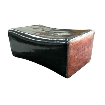 Lot 123 - A Japanese laquered possibly leather decorated...