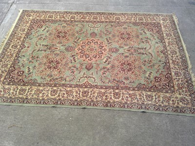 Lot 128 - A Wilton Persian Rug. The Rug measures 300cm...