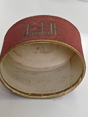 Lot 10 - DUNHILL - A 'Baby Sylph' silver-plated engine turned miniature lighter.