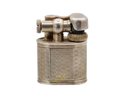 Lot 10 - DUNHILL - A 'Baby Sylph' silver-plated engine turned miniature lighter.