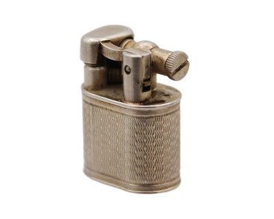 Lot 10 - DUNHILL - A 'Baby Sylph' silver-plated engine turned miniature lighter.